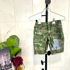 Boys size 8 distressed shorts  from a clean smoke free home!